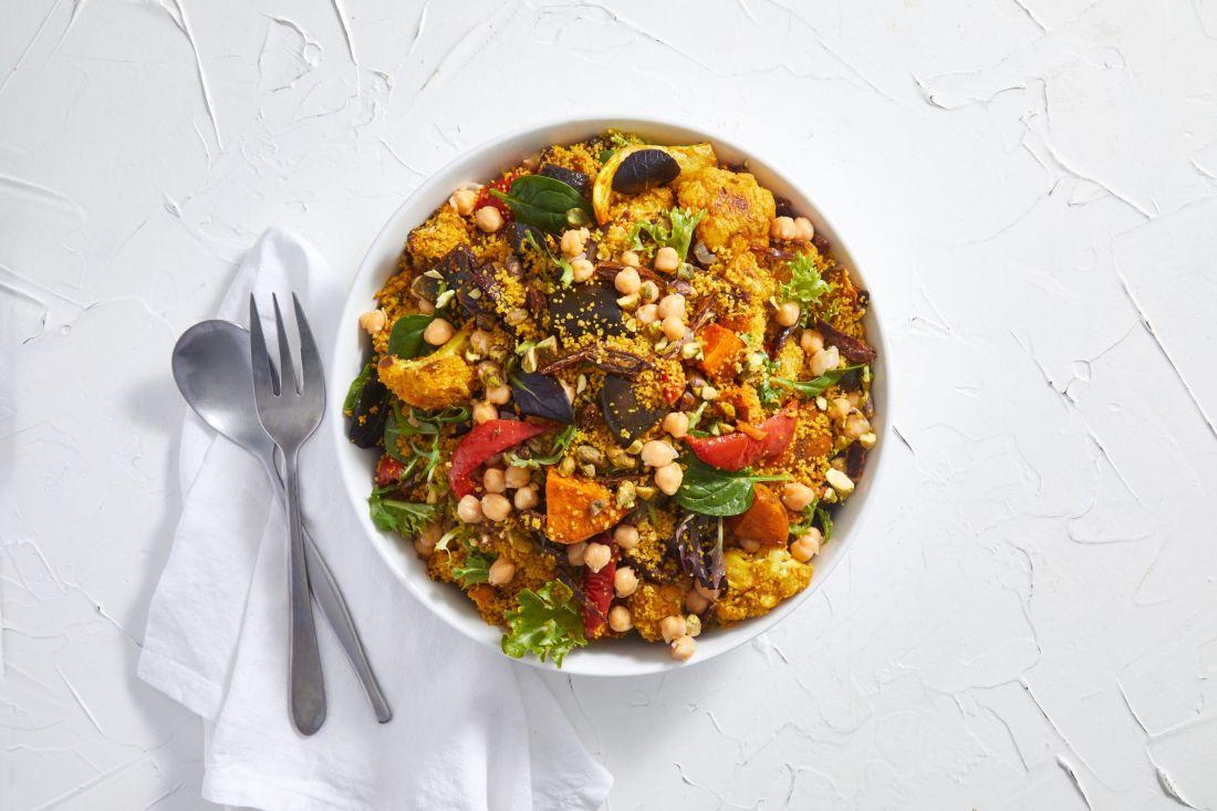 Cous Cous w/ Chermoula Spiced Roast Vegetables, Chickpeas, dates, Cumin roasted cauliflower and Pistachio, served with Preserved Lemon Dressing