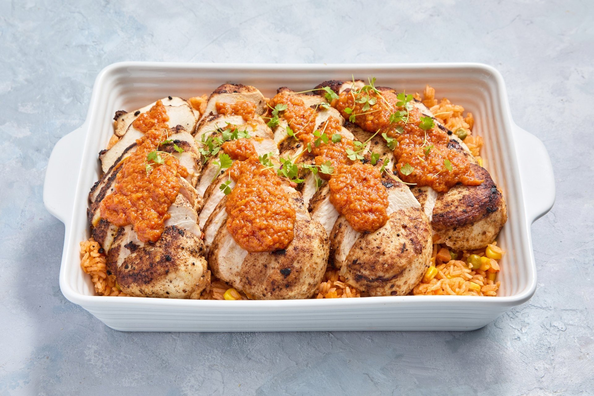Dish: Portuguese Style Chicken breast House Made Perri Perri served with Tomato rice (Serves 6-8pax)